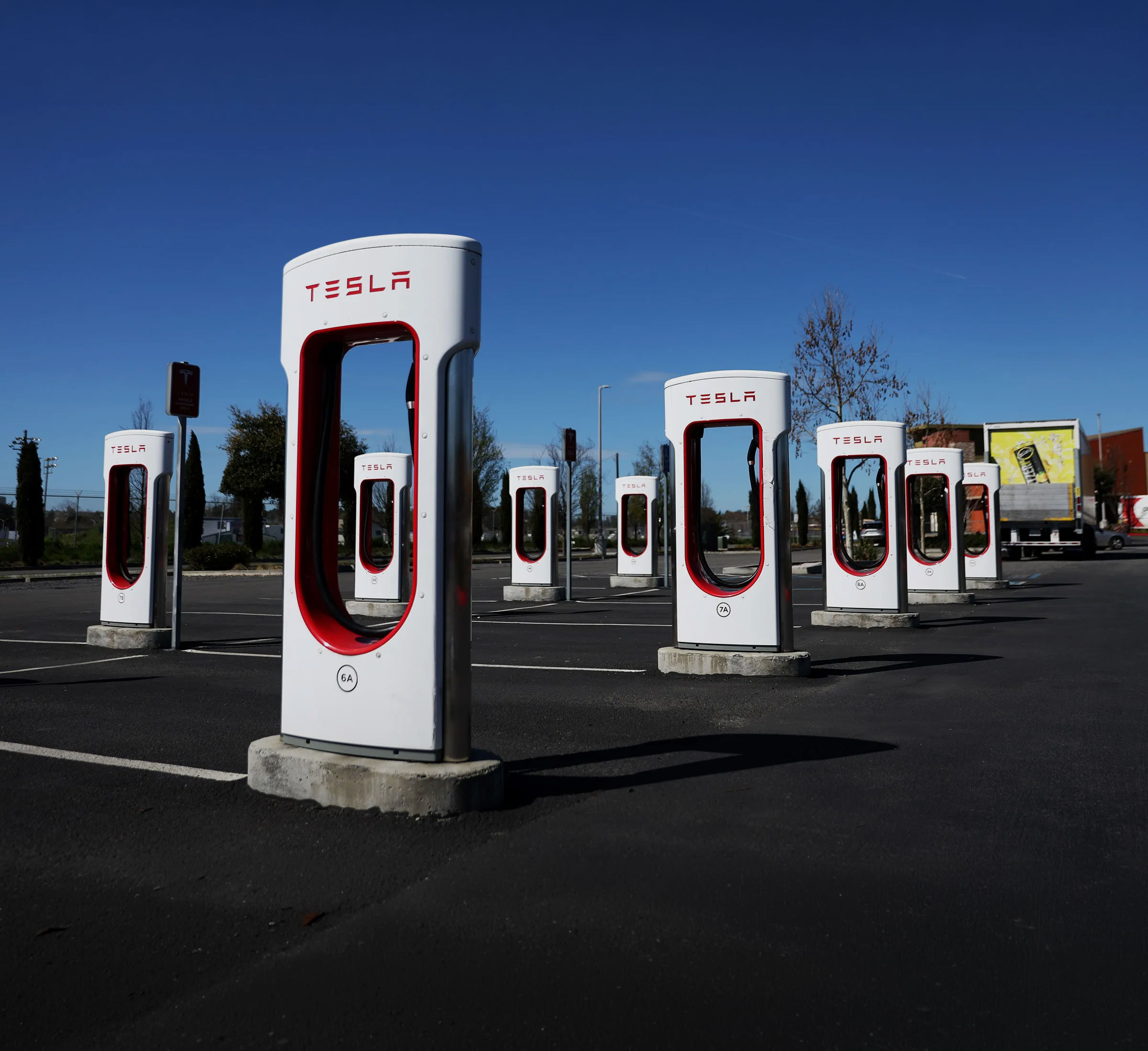 A Tesla Supercharger station. Built before the market demanded it